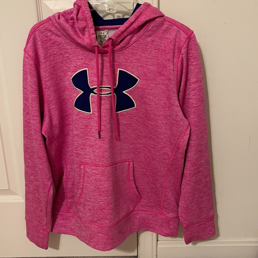 Brand: Under Armour Color: Pink with blue symbol Size: Medium